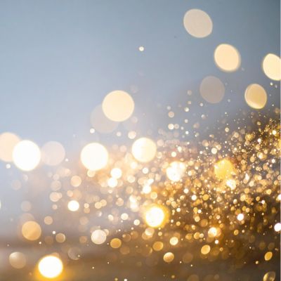 Glitzer, damit du strahlen kannst Goldene Lichtpunkte und Glitzer, verschwommen